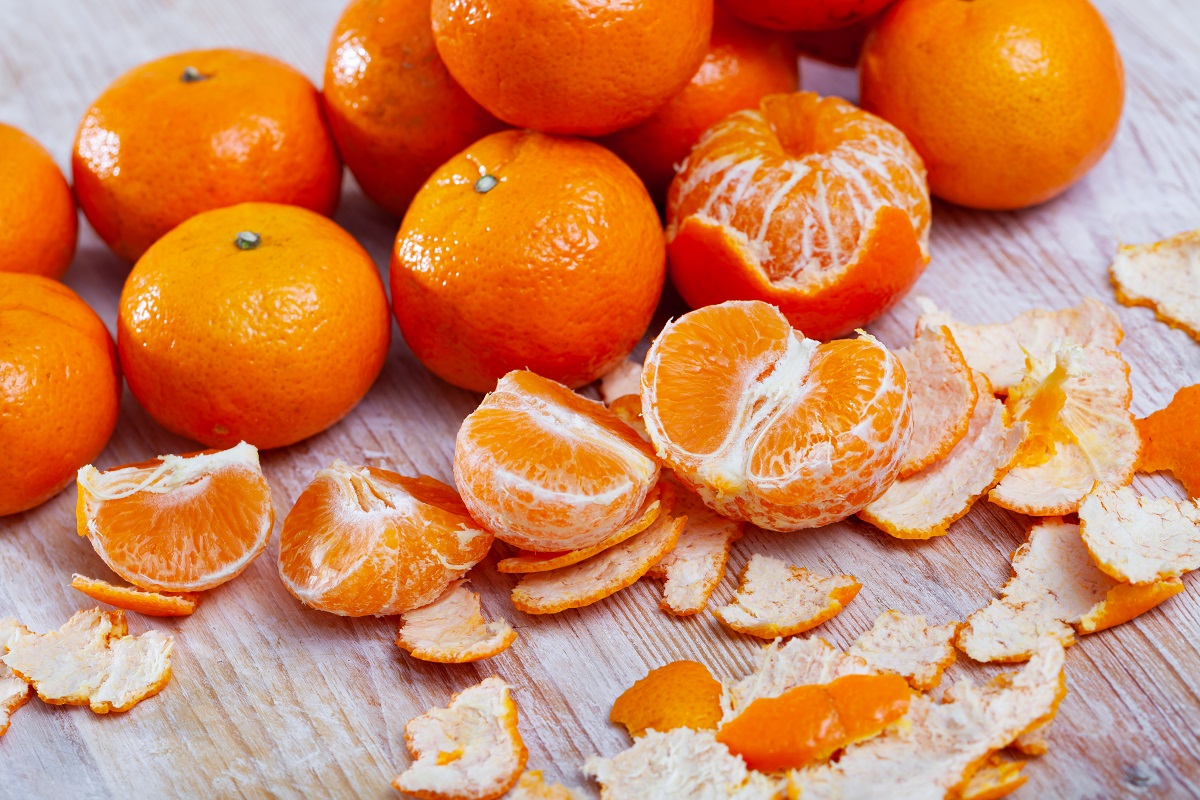 Ripe,Peeled,Tangerines,On,Wooden,Table,In,Kitchen,,Nobody