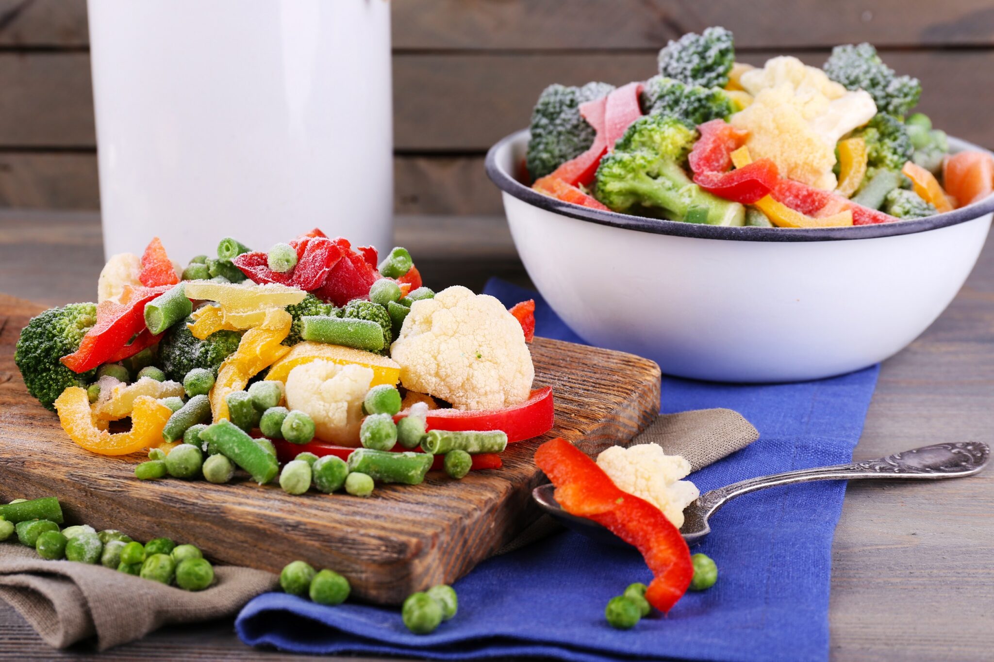 Frozen,Vegetables,On,Cutting,Board,,On,Napkin,,On,Wooden,Table