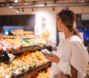 Young,Woman,Girl,Buyer,Client,Consumer,Stands,In,Shop,Store