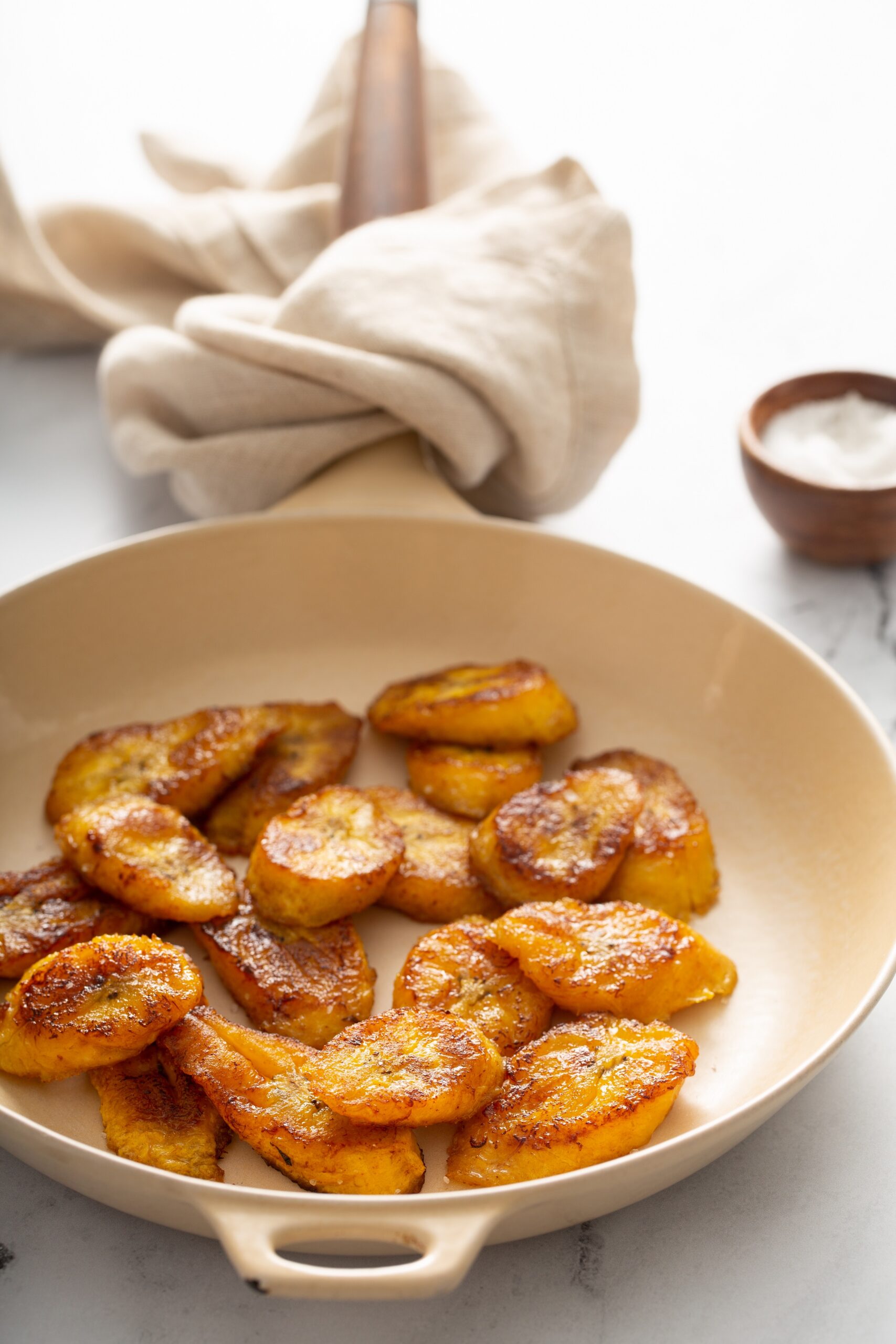 Fried,Caramelized,Plantains,In,A,Cast,Iron,Pan