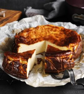 Tasty,Basque,Burnt,Cheesecake,On,Dark,Background