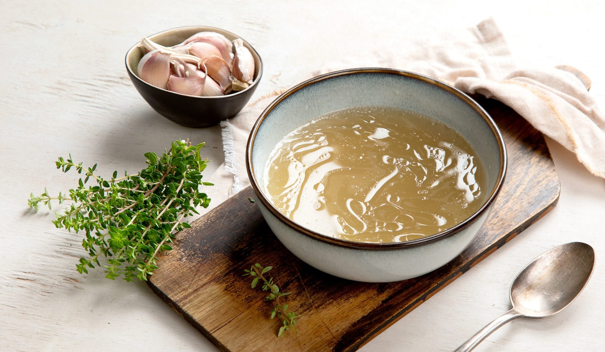 Broth,In,Bowl,On,Gray,Background,,Healthy,Food
