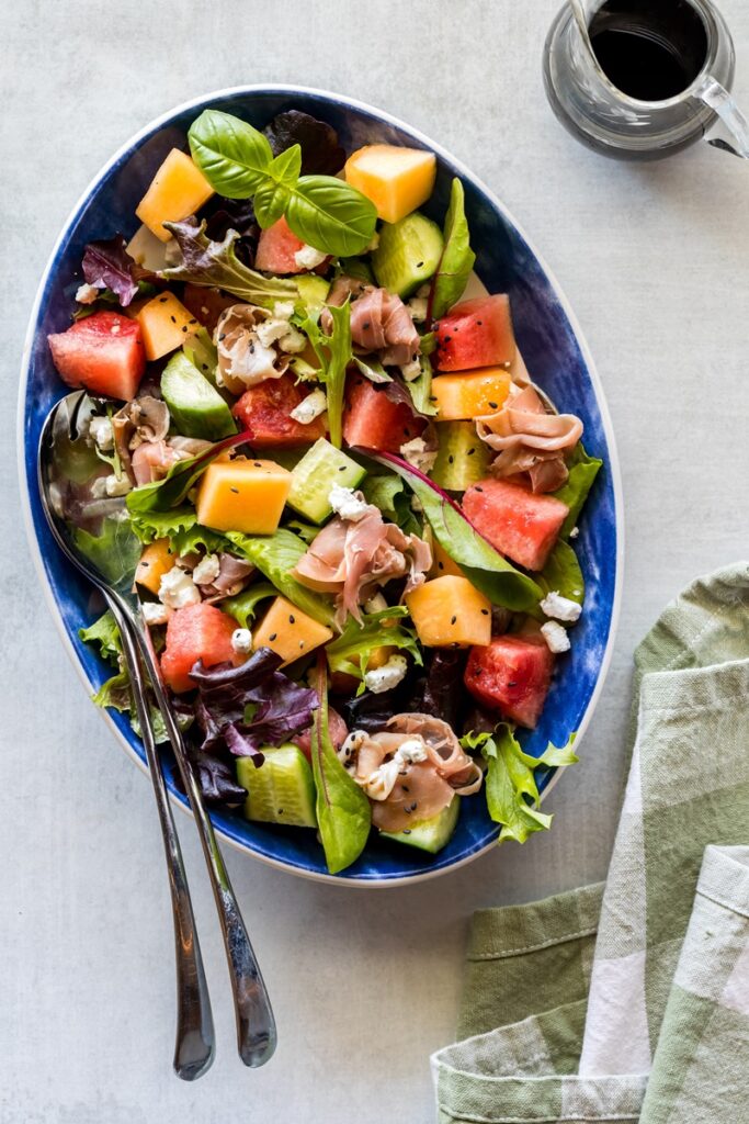 Melon,And,Prosciutto,Mixed,Green,Salad,,Ready,For,Serving.