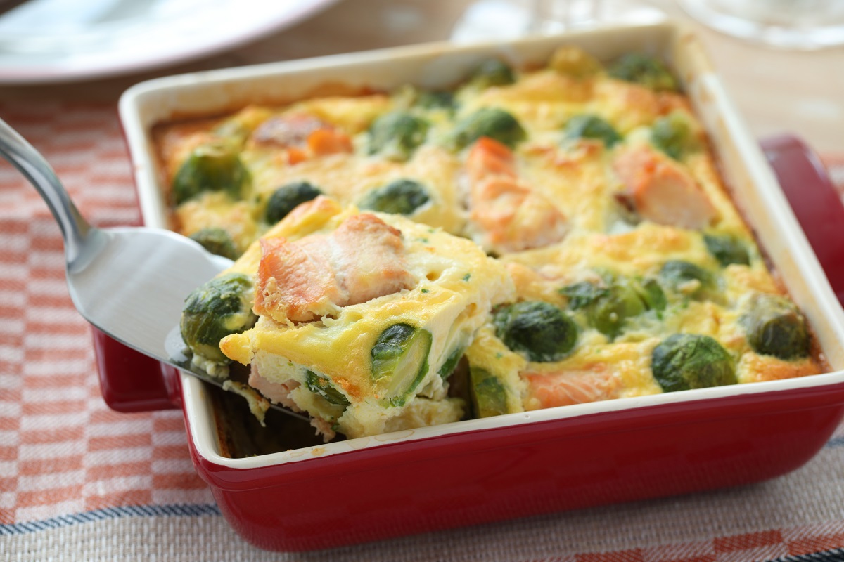 Salmon,And,Brussels,Sprout,Gratin,In,A,Red,Baking,Dish
