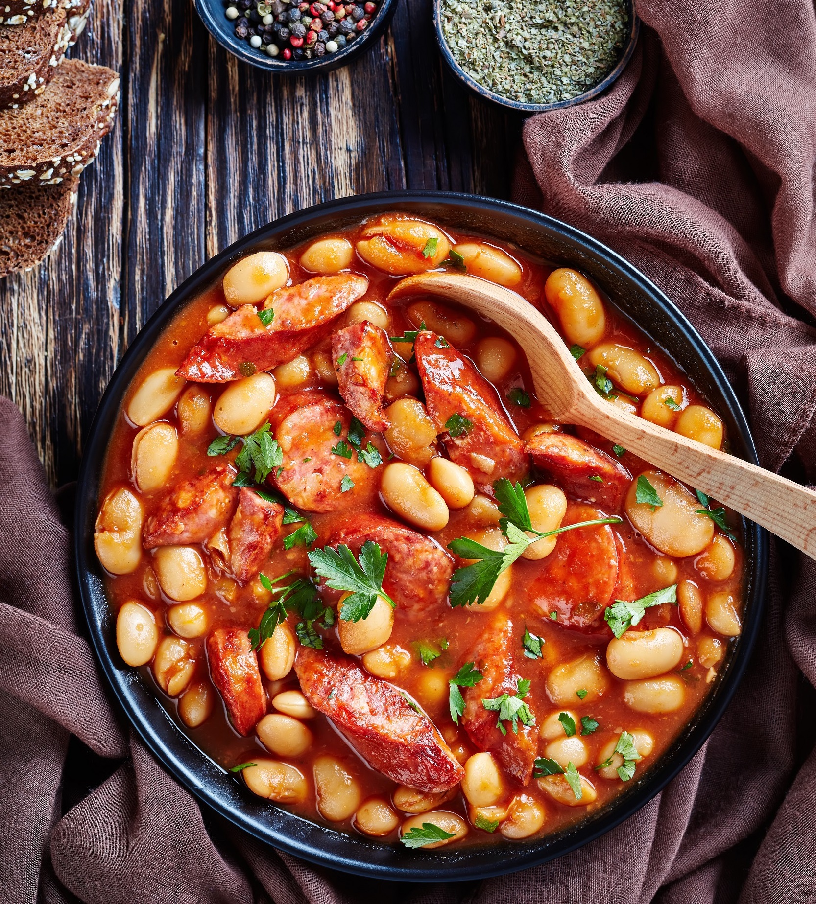 Overhead,View,Of,Hearty,Beans,Stew,With,Sausages,,Herbs,And