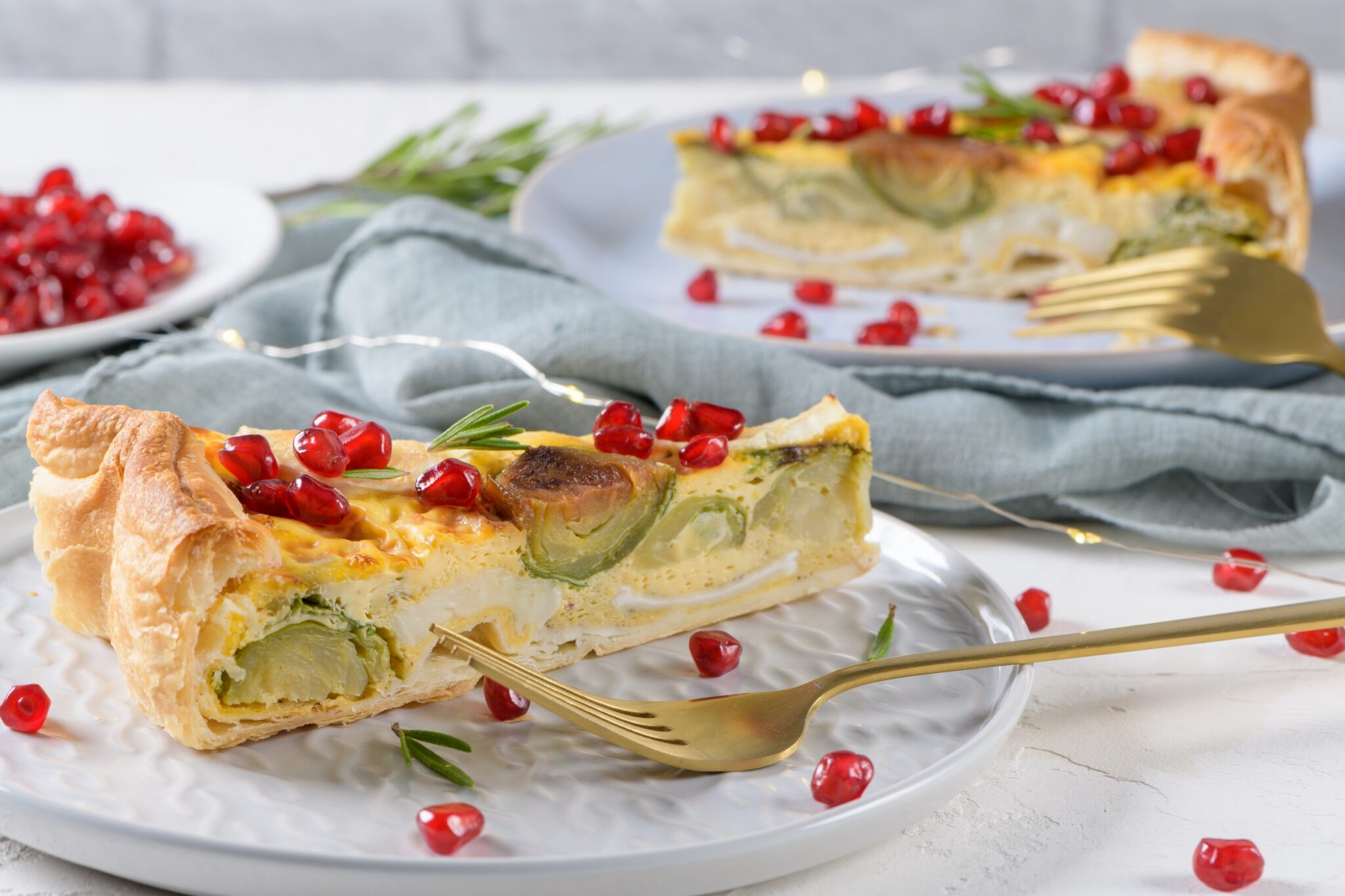 Homemade,Vegetable,Quiche,With,Goat,Cheese,,Brussels,Sprouts,And,Pomegranate