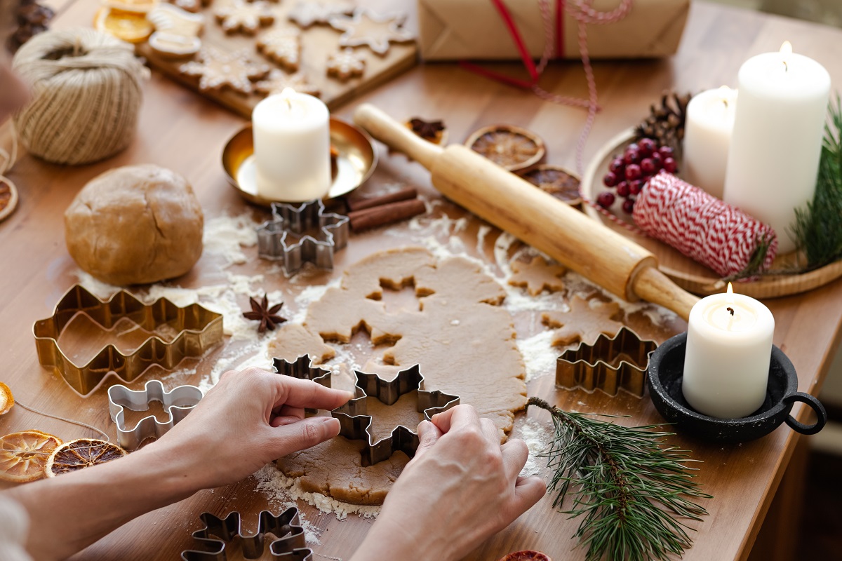 Young,Woman,In,Process,Of,Baking,Christmas,Pastry,,Cutting,Cookies