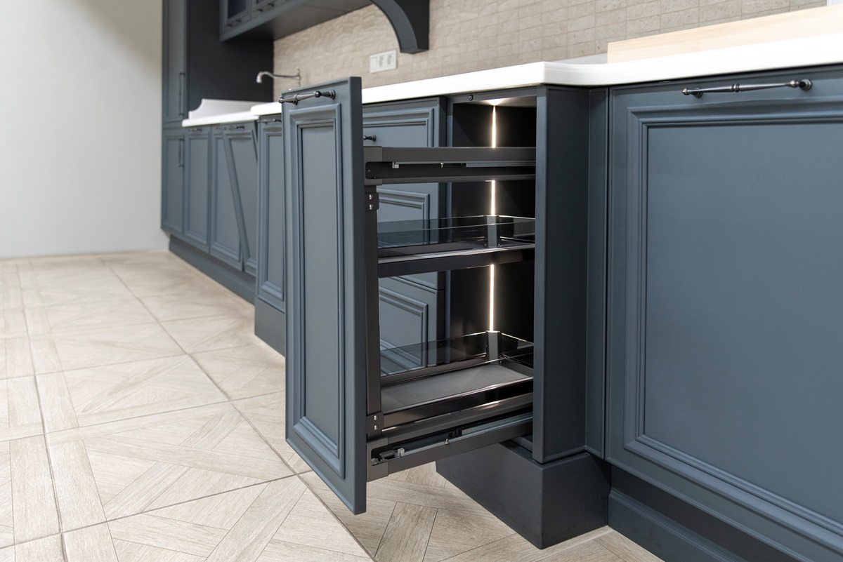Open,Deep,Drawer,In,A,Classic,Dark,Blue,Kitchen,Interior