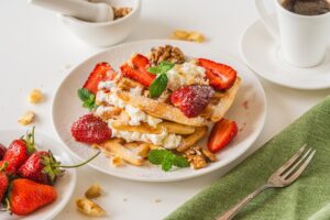 Belgian,Waffles,With,Cottage,Cheese,Cream,,Strawberries,,Walnuts,And,Mint