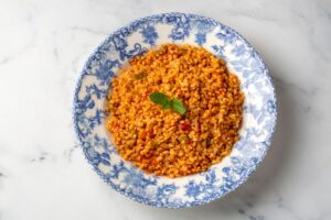 Traditional,Turkish,Bulgur,Pilaf,With,Tomato,Sause,In,Plate,(turkish