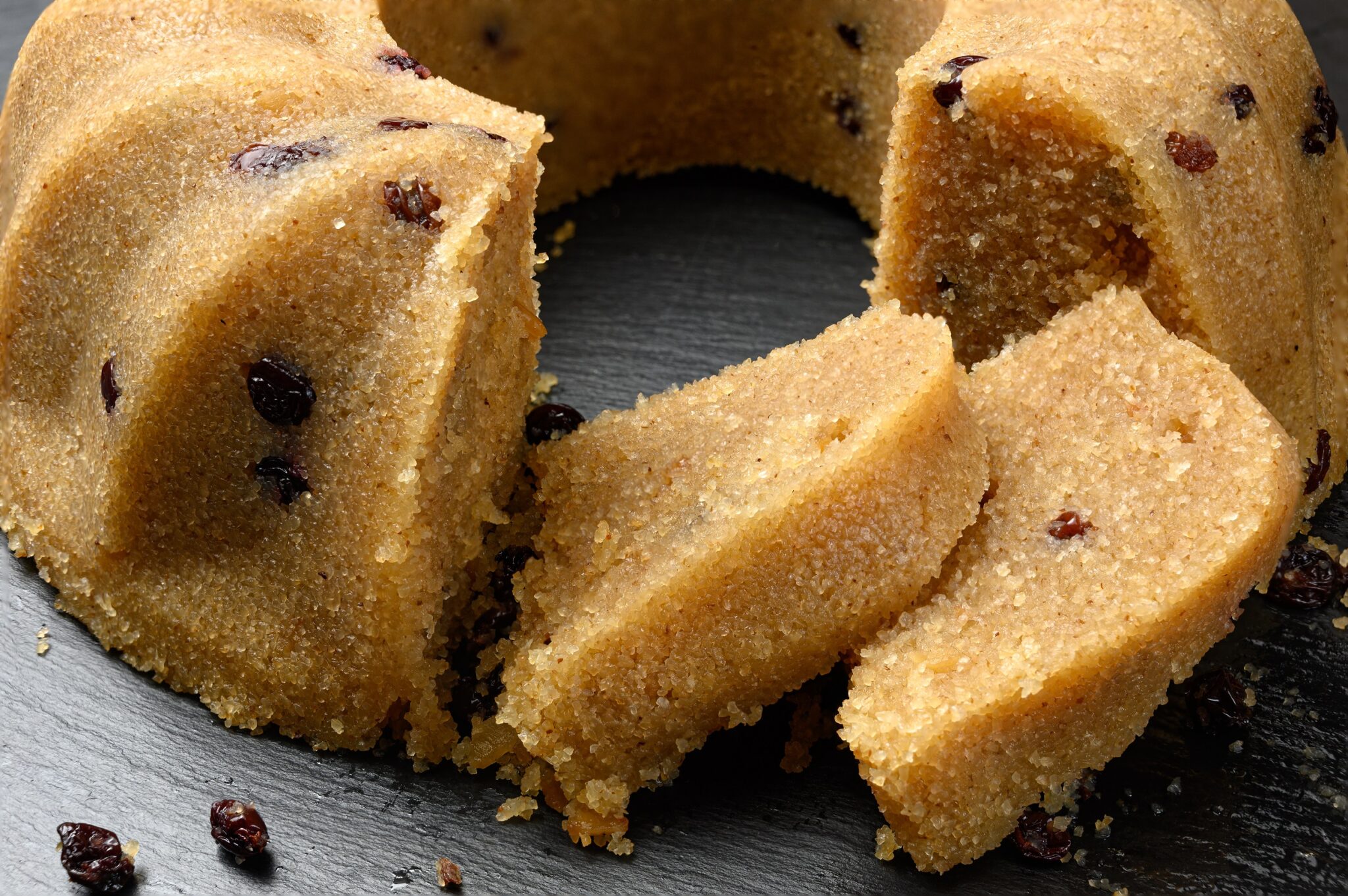 Homemade,Semolina,Halva,With,Raisins,Served,On,Black,Dish