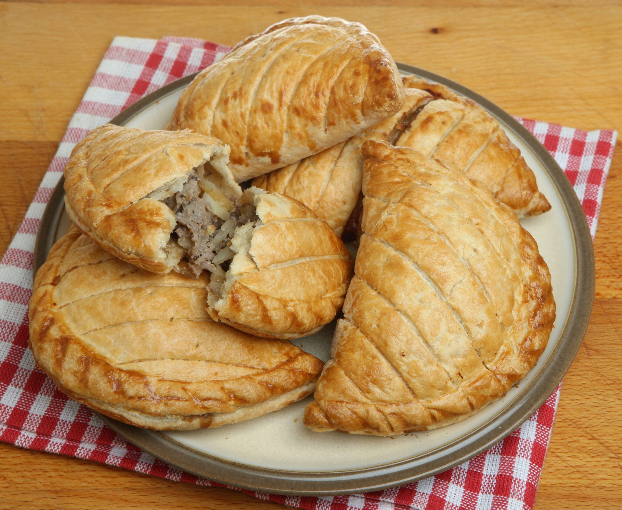 Cornish,Pasties,Piled,On,A,Plate