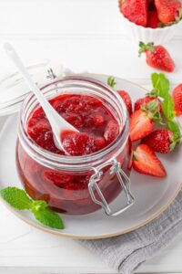 Strawberry,Jam,In,The,Glass,Jar,With,Fresh,Berries,On