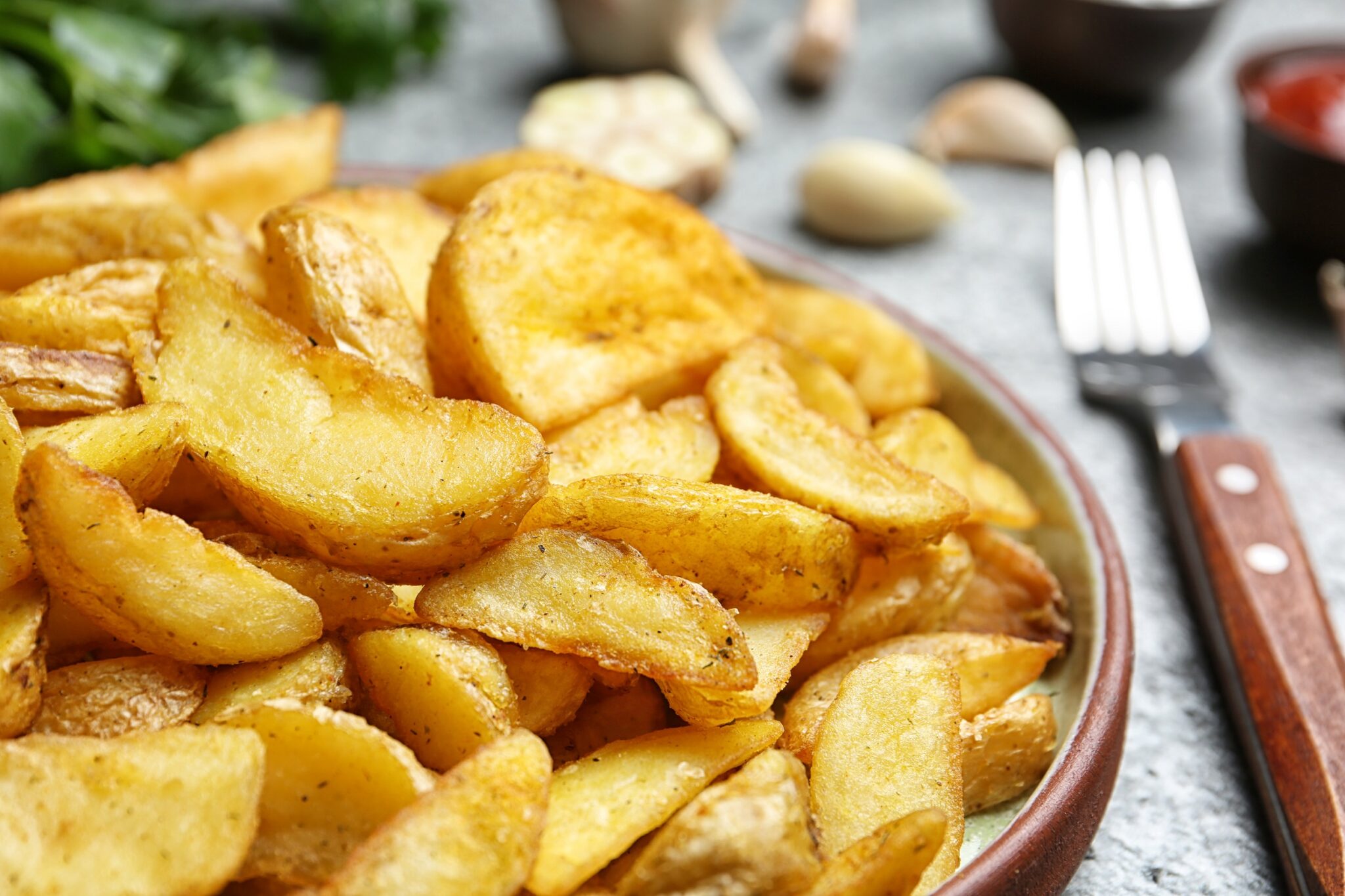 Plate,With,Tasty,Baked,Potato,Wedges,On,Table,,Closeup