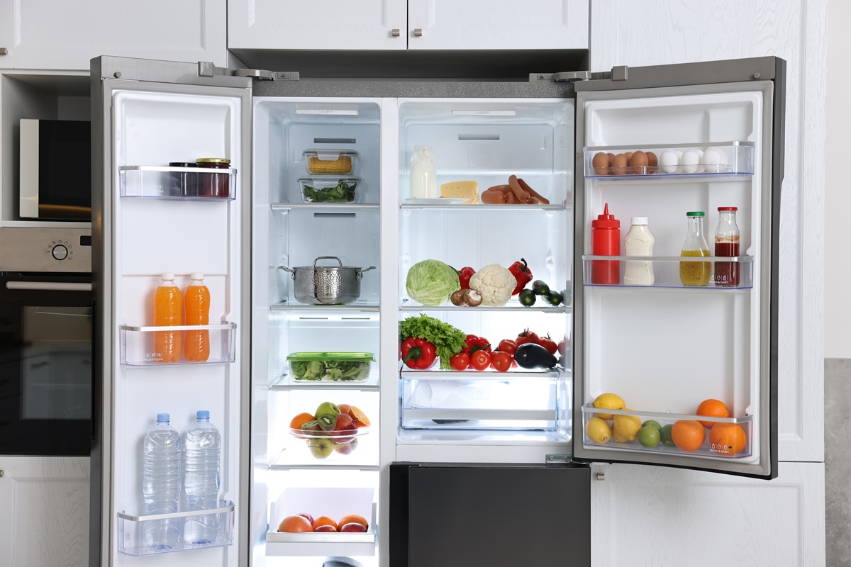 Open,Refrigerator,Full,Of,Different,Products,In,Kitchen