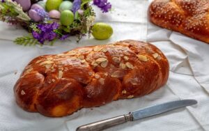 Easter,Sweet,Bread,,Tsoureki,Braid,And,Easter,Eggs,On,The