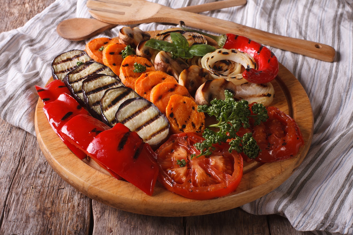 Grilled,Vegetables,On,A,Kitchen,Board,On,A,Table,Close-up.