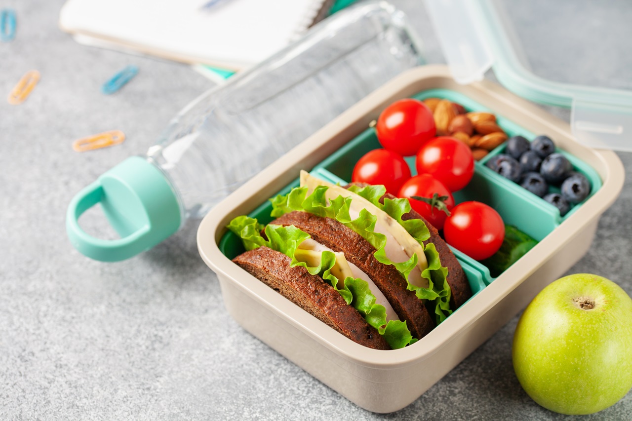 School,Lunch,Box.,Ham,And,Cheese,Sandwich,,Vegetables,,Nuts,And