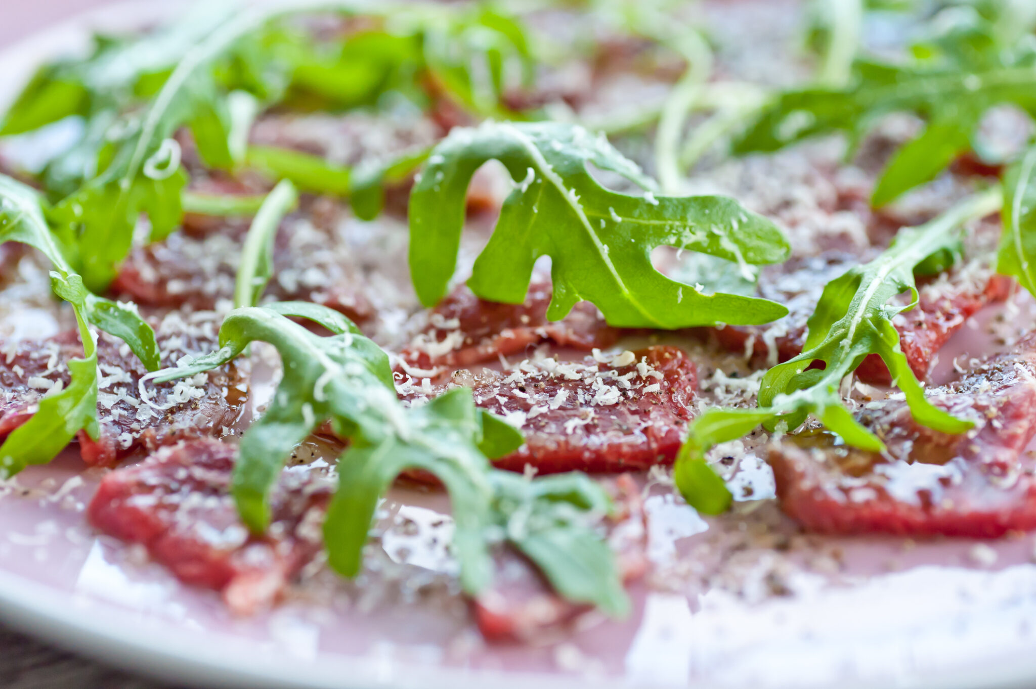 Carpaccio with sallad and parmesan cheese